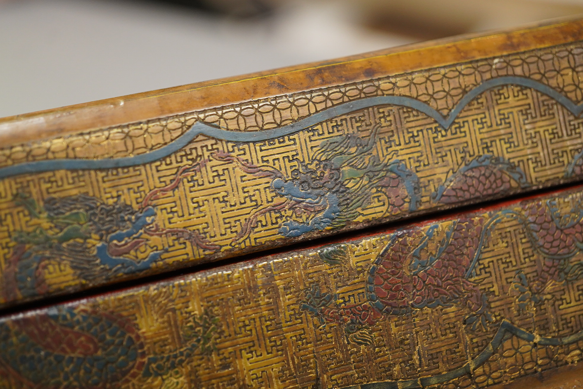 A Chinese inscribed polychrome lacquer document box, Qianlong mark and inscription